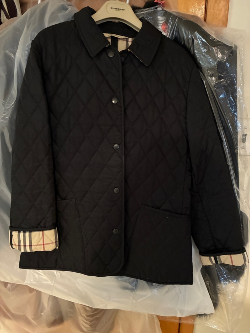Burberry Black Quilted Jacket with Signature Check Cuffs